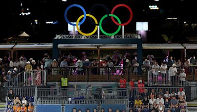 From pin trading to biting medals: The fun Olympic traditions athletes participate in during the Games