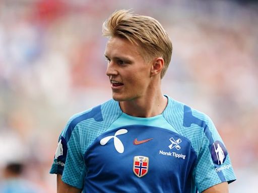 Arsenal’s Martin Odegaard limps out of Norway win with apparent ankle injury