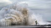 Flooding feared as heavy rain and strong gusts hit parts of UK