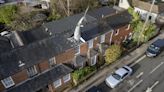House with 25ft shark sticking out of roof banned from Airbnb