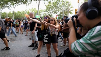 'Not for sale': Why are people squirting water on tourists in Barcelona