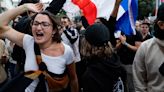 French vote gives leftists most seats over far right, but leaves hung parliament and deadlock