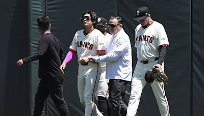 Giants place Lee on 10-day IL with left shoulder dislocation