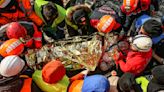 Rescuers rejoice as more quake survivors emerge from rubble