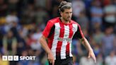 Tristan Crama: Brentford defender joins Exeter City on season-long loan