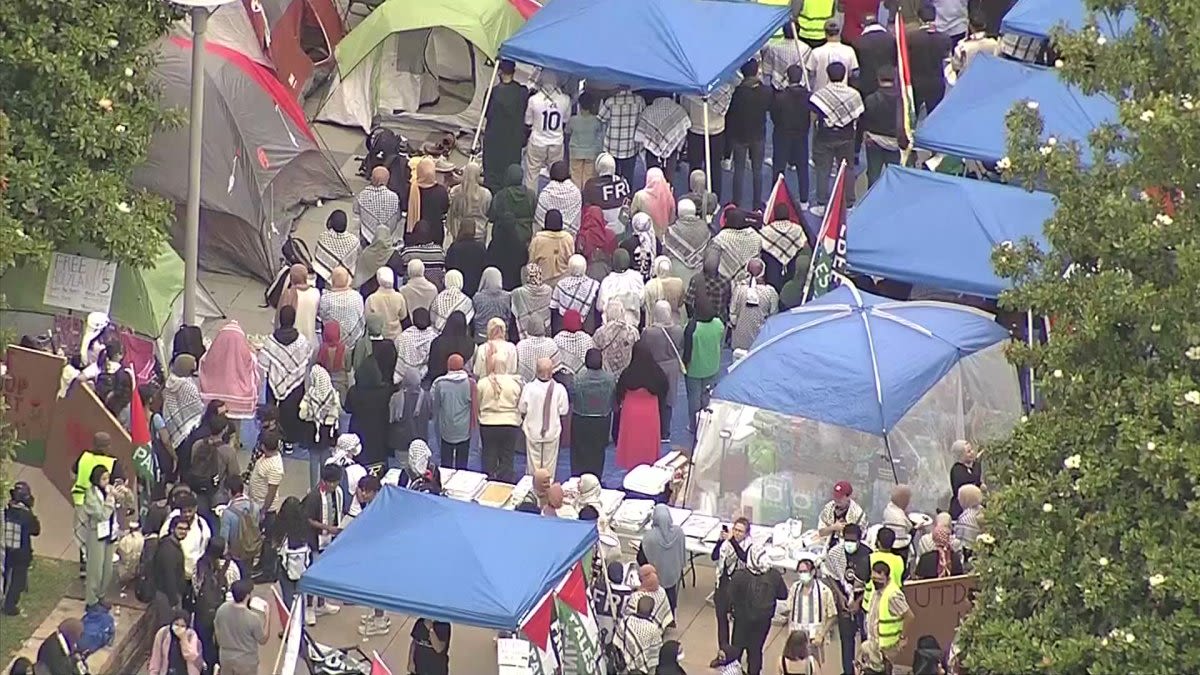 Pro-Palestine protestors gather in an encampment at UT Dallas