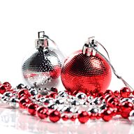 Small, decorative objects typically hung on Christmas trees. Available in a wide range of designs and materials, including glass, wood, and porcelain. Symbolic and sentimental, ornaments add a personal touch to holiday decor.