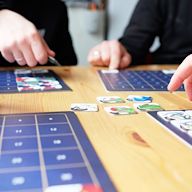 A board game that is designed to be played in a social setting, such as a party or gathering. Often involve humor, fast-paced gameplay, and easy-to-learn rules. May include elements of trivia, physical challenges, or social deduction.