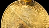 Gold disc found in Norse treasure pile is oldest-known reference to Odin, experts say
