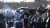 Fans hustle to get to warm after frigid Chicago Bears game at Soldier Field on Christmas Eve