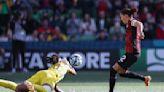 Nigeria's Nnadozie denies Canada's prolific scorer Sinclair in a 0-0 draw at the Women's World Cup