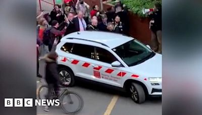 Cardiff Uni: Jacob Rees-Mogg chased by protesters after talk