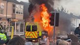 Officers hurt and police van set alight in Southport