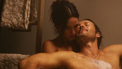 Adria Arjona Says She and Glen Powell Filmed ‘Hit Man’ Sex Scenes in Pain From ‘Crazy’ Rashes