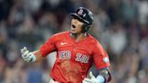 Boston's Ceddanne Rafaela tagged out for double play while talking to third base coach Kyle Hudson