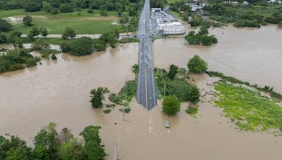 Hurricane Ernesto drops torrential rain on Puerto Rico as it strengthens heading toward Bermuda