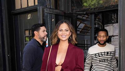 Chrissy Teigen Wore a Berry Crochet Bra as a Top in New York City