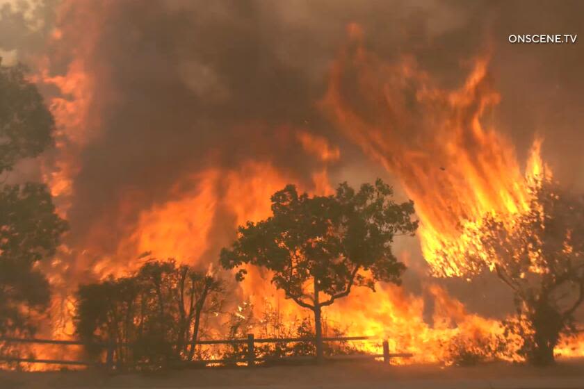 Hawarden and Eagle fires char 2,000 acres in Riverside County; structures burn, residents flee