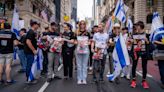 ‘Here to raise our voice’: Hostage families lead thousands down Fifth Ave. in annual Israel parade - Jewish Telegraphic Agency