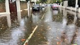 Heavy downpours lead to flooding and transport disruption