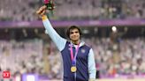 Chopra to rely on consistency to defend Olympic gold as Indian athletes begin campaign - The Economic Times