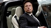 Tesla hit by first ever drop in annual profits amid electric car price war