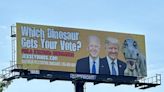 'Which dinosaur gets your vote'?: Eye-catching billboard on Rt. 80 before first debate