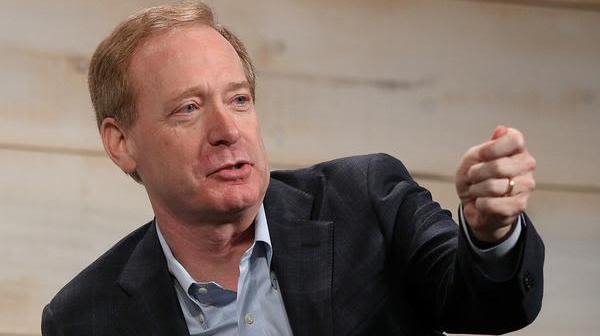 Microsoft president Brad Smith, Kathy Surace-Smith join Mariners ownership group - Puget Sound Business Journal