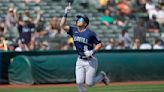 Dominic Canzone homers and drives in 4 runs as the Mariners beat the A's to keep pace with rivals