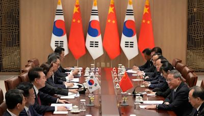 China calls on Japan and South Korea to reject ‘protectionism' in trilateral summit