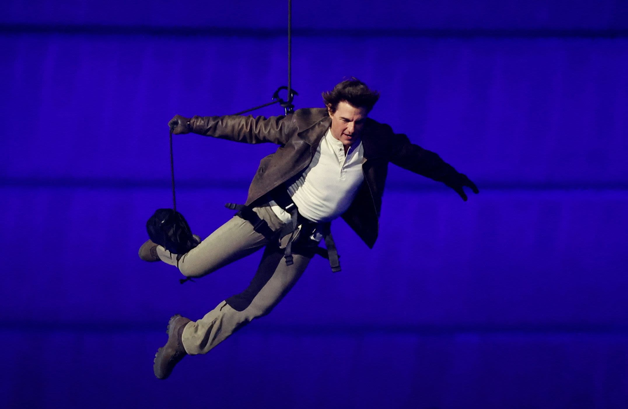 Tom Cruise Did His Daring Skydiving Stunt at Olympics Closing Ceremony for Free