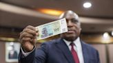 Zimbabwe’s Central Bank Chief Sees Deflation Risk From Strong ZiG