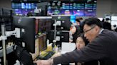 Stock market today: Asian shares mostly higher ahead of consumer confidence and price data