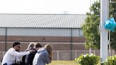 Teen suspect in Georgia high school shooting was investigated for online threats last year