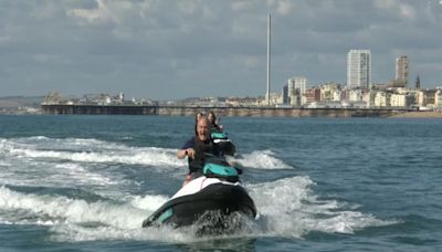 Sir Ed Davey zooms into Sussex on jet ski