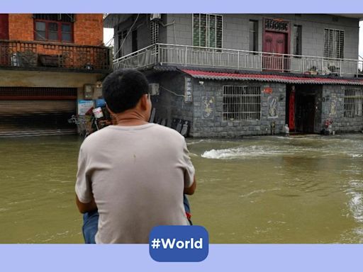 Man holds pregnant wife afloat for three hours during floods in China, video of rescue goes viral