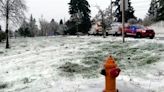 Power line falls on car during Oregon ice storm, killing 3 and injuring a baby, authorities say