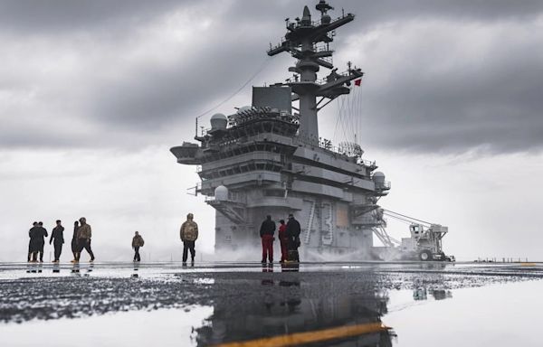 See aboard USS George Washington, an aircraft carrier with a checkered recent history