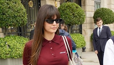 Nina Dobrev looked stylish in Paris with a knee brace and cane