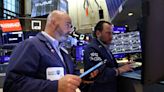Futures up as easing price pressures set Wall St for weekly gains