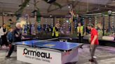 Watch: 120 players participate in table tennis rally for world record