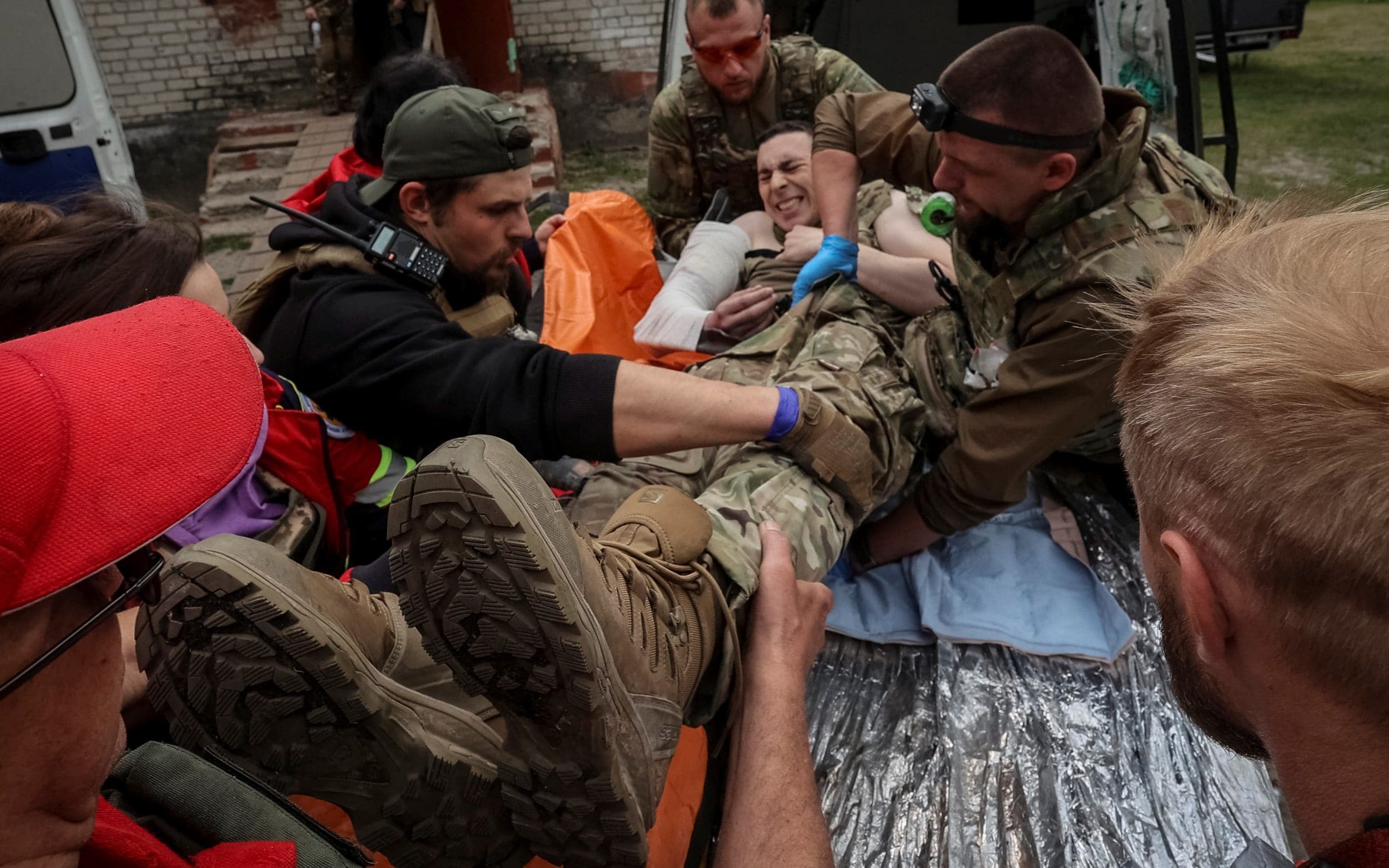Thousands flee as Russian soldiers ‘walk in’ to Ukrainian village