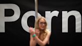 Pornhub owner agrees to pay $1.8M and independent monitor to resolve sex trafficking-related charge