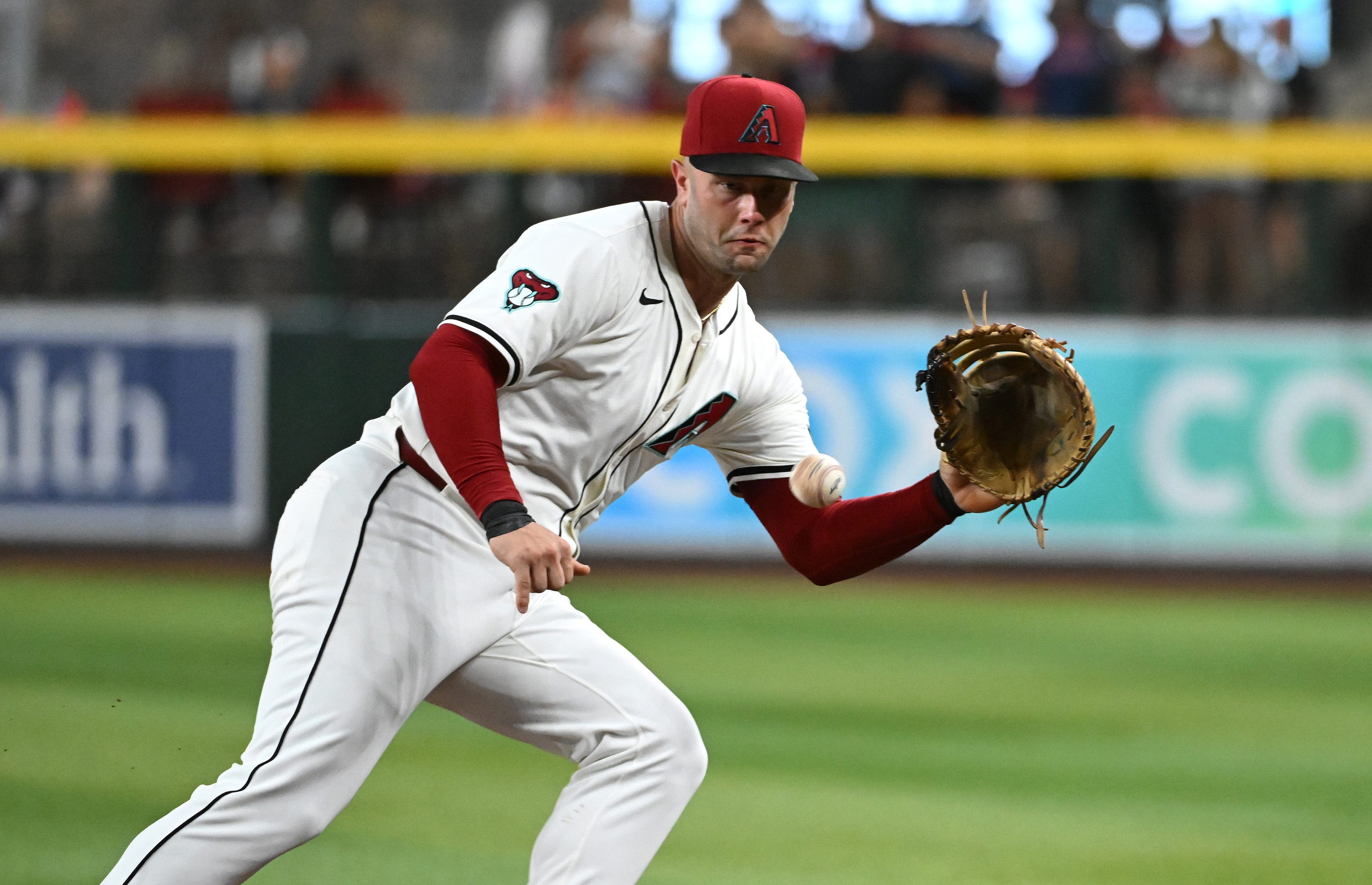 Arizona Diamondbacks’ Christian Walker hopes to return in 3 weeks from oblique strain