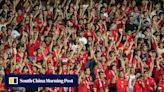 Trio bailed after arrest at Hong Kong football game for insulting national anthem