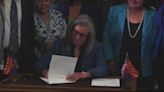 Arizona Gov. Katie Hobbs signs a repeal of the state’s total abortion ban, which was first passed in 1864.