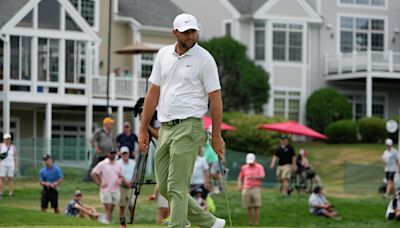 Scottie Scheffler builds momentum at Travelers Championship, waits out rain delay with diaper change