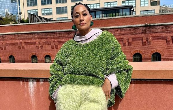 Tracee Ellis Ross Lets Loose in a Grassy Tinsel Sweater and Shaggy Yellow Shorts