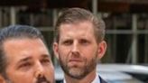 Donald Trump Jr. (L) and his brother Eric speak to reporters outside the Manhattan court where their father is on trial