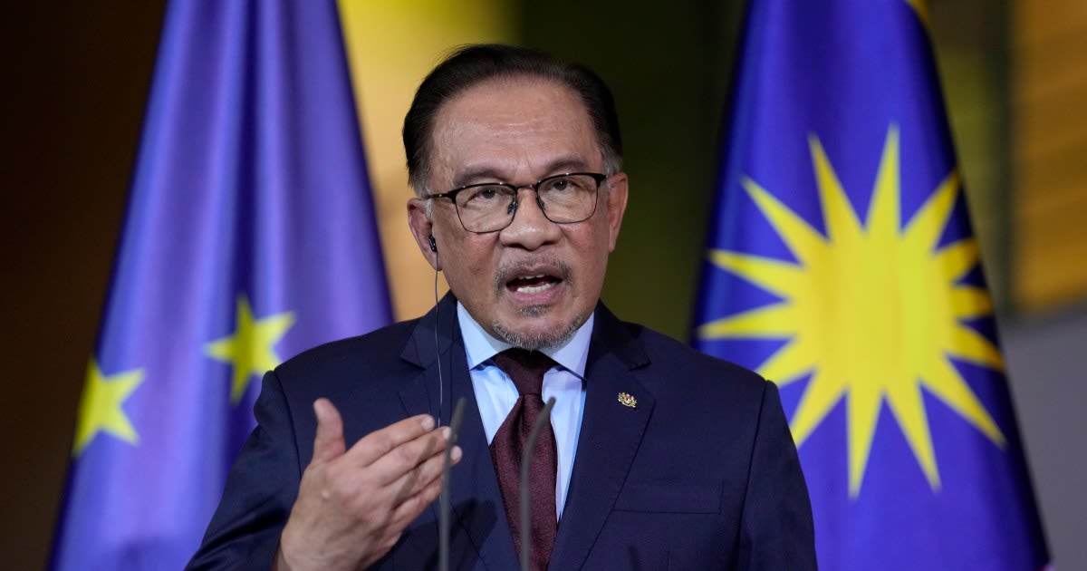 Malaysia’s Anwar unveils record public pay hike amid ringgit’s slide